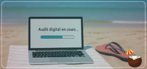 Ordinateur posé sur une serviette de plage